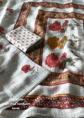 Linen chex floral saree.